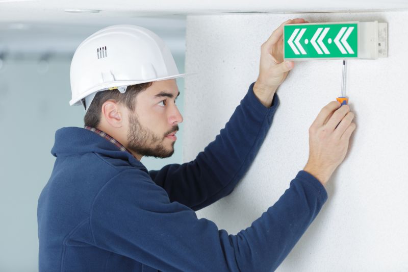 Workers Installing Exit Door